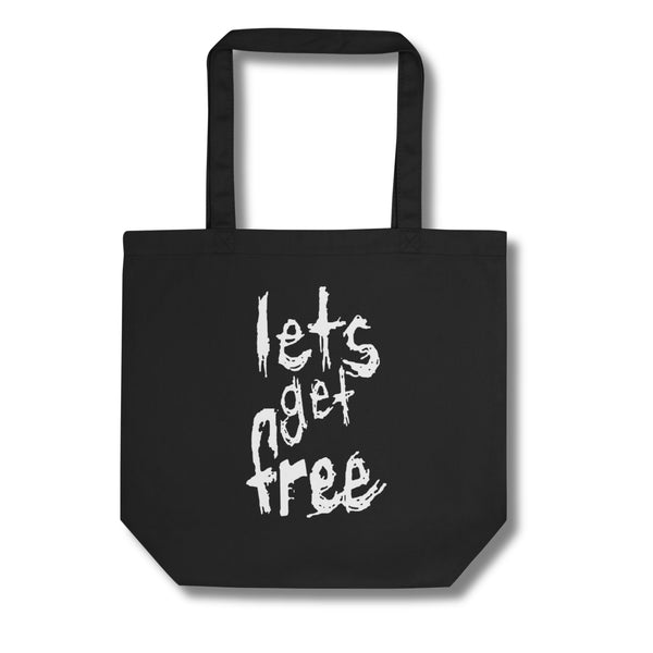 Black tote bag with white text 'let's get free' on a white background