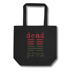 Black tote bag with 'dead prez' text and logo on a white background